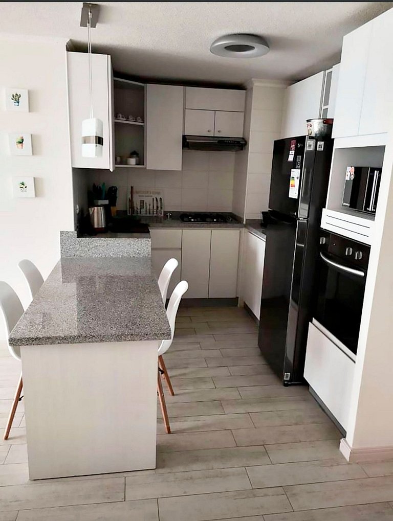 Smart Host Rentals - Estilo e Conforto à Beira-Mar