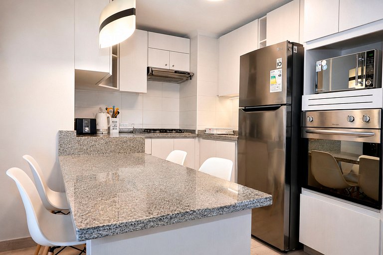 Smart Host Rentals - Estilo e Conforto à Beira-Mar